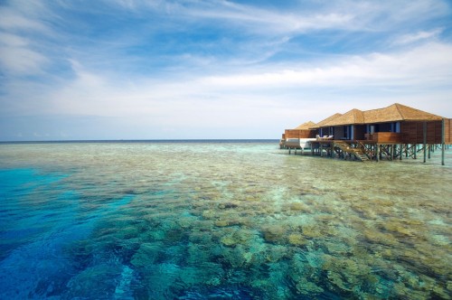 LilyBeach_SunsetWaterSuite_Exterior_ReefView_CrownToursMaldives.jpg