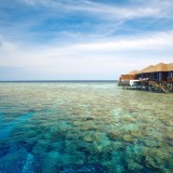 LilyBeach_SunsetWaterSuite_Exterior_ReefView_CrownToursMaldives