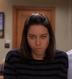 parks-and-rec---sneaky-mysterious-april.gif